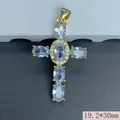 Detailed macro view of the 19.2x30mm gold-plated cross pendant with clear oval zirconia. - 19.2x30mm / White