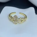 Detailed close-up of a gold-plated butterfly ring adorned with sparkling cubic zirconia - Butterfly Design (A) / Gold