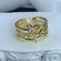 Close-up detail of a gold plated adjustable open ring featuring butterfly cubic zirconia - Stacked Butterfly Style (C) / Gold