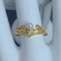 Elegant gold-plated crown ring with pearl and cubic zirconia details on white stand - Pearl Zirconia Crown Style (D)