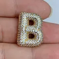 Detailed macro view of a gold plated micro-pave cubic zirconia letter B pendant for jewelry DIY - Letter B (030)