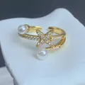 Detailansicht eines vergoldeten verstellbaren Rings mit Zirkonstern und Perlen - Pentagramm Perle Stil (G) / Einstellbar Offen / Gold