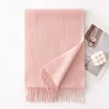 Soft pink wool scarf with tassels for winter warmth and elegant styling. - 30x180cm / Pink