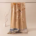 Close-up of a luxurious silk scarf featuring traditional Chinese magnolia and bird prints - Jiangnan Water Village / 53x192cm