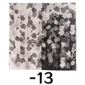 Close-up detail of the elegant rose and butterfly print on a dual-tone silk-like square scarf. - Camellia Butterfly Monochrome (FH25-QC-2-13) / 85x180cm
