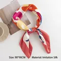 Elegant 90x90cm square silk scarf with colorful geometric pattern made of faux silk - Pink Flowers (FH23-5132-1)