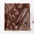 Elegant lightweight brown shawl with artistic water ripple print and delicate fringed edges - 190cm x 90cm / Water Ripple Brown