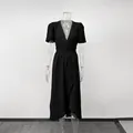 Front view of an elegant black short-sleeved wrap midi dress for summer - S / Dresses / Black