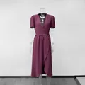 Front view of an elegant purple V-neck short sleeve wrap maxi dress on a mannequin - S / Dresses / Burgundy