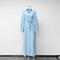 Elegant light blue long-sleeved wrap maxi dress featuring flare sleeves and a waist belt - Dresses / Light Blue
