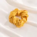 Premium large golden yellow silk scrunchie hair tie with an elegant satin finish for women - Turmeric