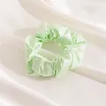 Elegant premium mint green silk scrunchie with satin finish on white rippled fabric - L / Light Grass Green