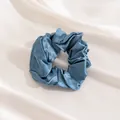 Elegant navy blue pure silk scrunchie with a glossy satin finish on cream fabric background - L / Haze Blue