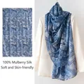 Blue artistic print 100% mulberry silk scarf displayed on a white blazer - 176*110cm / Blue Architecture (FHZ25-9721-1)