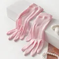 Elegant pink mulberry silk sun protection gloves for women, ideal for summer and stage. - One Size / Light Pink