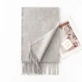 Elegant light grey wool scarf featuring classic fringe tassels for chic winter warmth - 30x200cm / Light Gray
