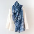 Elegant blue mulberry silk long scarf with Bohemian pattern draped on a white blazer - 176x110cm / Blue Architecture (FHZ25-9721-1)