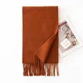 Caramel brown wool scarf featuring thick texture and fringe details for winter style. - 30x200cm / Caramel color