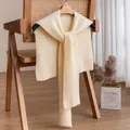 Off-white knitted striped shawl scarf draped on a wooden chair with cozy home decor - 40*93cm / Beige