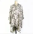 Elegant rose floral print split shawl poncho in a soft beige cashmere-like fabric. - Jacquard Rose Print