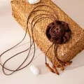 Close-up detail of a handmade brown silk flower necklace featuring beaded cord accents - Flower Shape (FHS25-3009-1) / Rose Brown