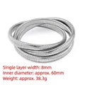 Eleganter dreilagiger elastischer Schlangenkette-Armreif aus poliertem Edelstahl. - Dreilagiger Elastischer Schlangenknochen (8mm) / Innendurchmesser ca. 60mm / Stahlfarben