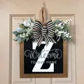 Wooden personalized front door welcome sign with letter Z, striped bow and greenery - Letter Z
