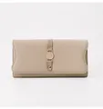 Front view detail of a premium beige pebbled leather long clutch wallet for women - Camel
