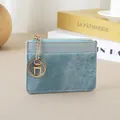 Slim light blue denim texture cardholder wallet with gold zipper and keychain detail - Blue