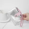Silver cracked leather wallet for women with pink wrist strap and pearl charm detail - Silver