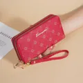 Elegant red long leather wallet with double zippers and floral pattern. - Red
