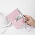 Stylish pink short wallet with pearl charm and silver wrist strap in crackle texture - Pink