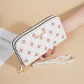 Elegant white floral patterned long wallet with double zippers and wrist strap - Off White