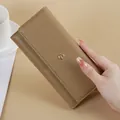 Elegant khaki long wallet for women with quilted design and gold clasp. - Khaki