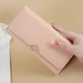 Elegant light pink PU leather long wallet for women with a minimalist V-shaped buckle - Pink