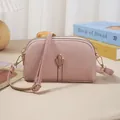 Petit sac bandoulière rose en cuir pour téléphone avec décoration tulipe et double zip. - Rose Nuage