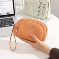 Große orangefarbene Damen-Handgelenktasche mit Doppelreißverschluss für Handys - Orange