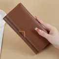 Classic brown PU leather long wallet for women featuring a stylish metal V buckle design. - Brown