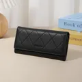 Black diamond quilted long wallet for women with elegant minimalist leather texture - Black