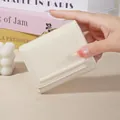 Elegant cream short wallet for women featuring a cute rabbit logo and premium gold clasp - Off White