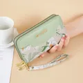 Floral embroidered long wallet for women with double zippers and wrist strap in sage green - Green