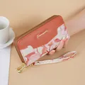 Elegant long floral patterned wallet with wrist strap in orange-red and cream fabric - Orange Red