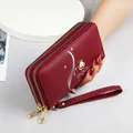 Elegant wine red long wallet for women with double zipper, pearl charm and wrist strap - Burgundy