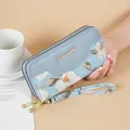 Elegant light blue long clutch wallet with floral embroidery and wrist strap for women - Blue