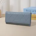 Elegant blue quilted long wallet for women featuring a classic rhombus stitching pattern - Blue