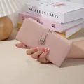 Elegant dusty pink long PU leather wallet with metal buckle closure and card slots. - Pink