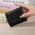 Black Japanese style short wallet with cute rabbit embossing and snap closure - Black