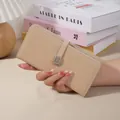 Elegant beige long PU leather wallet for women with stylish metal buckle strap closure - Apricot