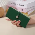 Dark green faux leather long wallet with buckle strap for women - Green