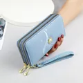 Elegant light blue double-zipper long wallet with wristlet strap and pearl decor - Blue